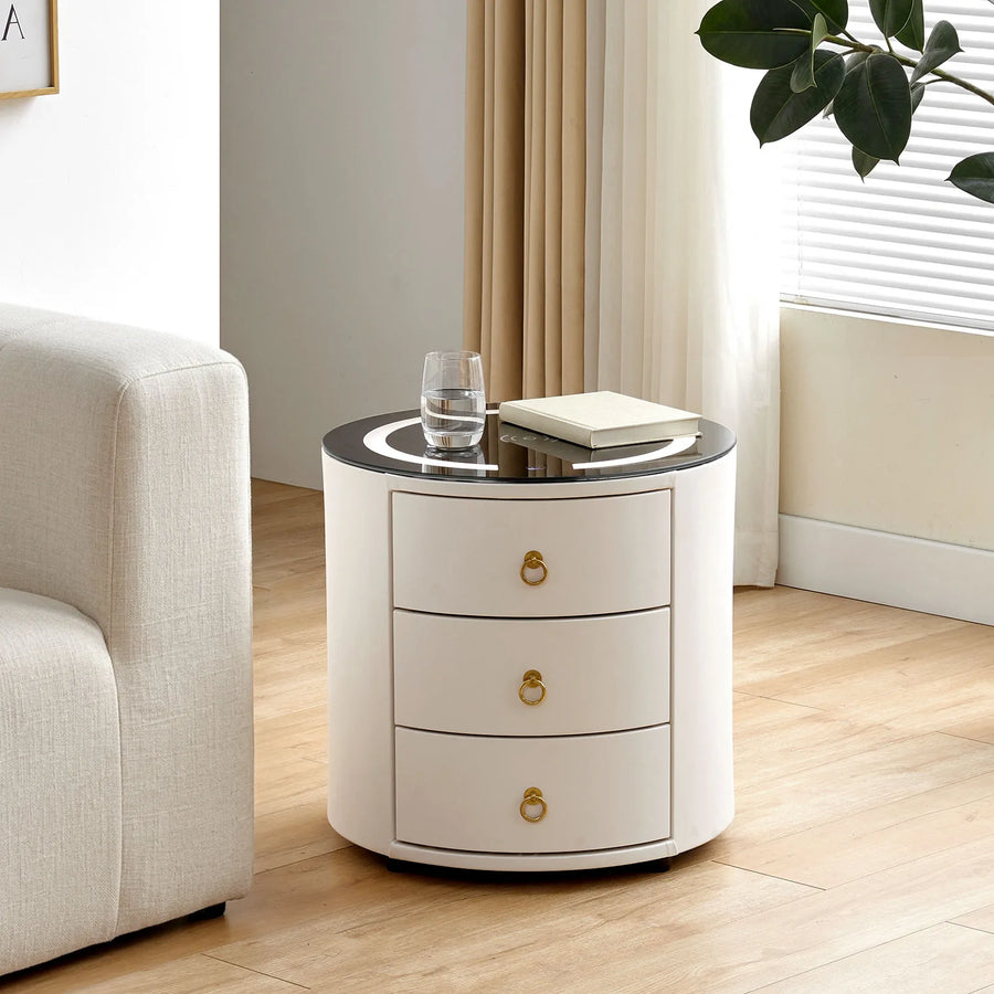Brookline smart bedside table in a modern living room beside the sofa during the day.