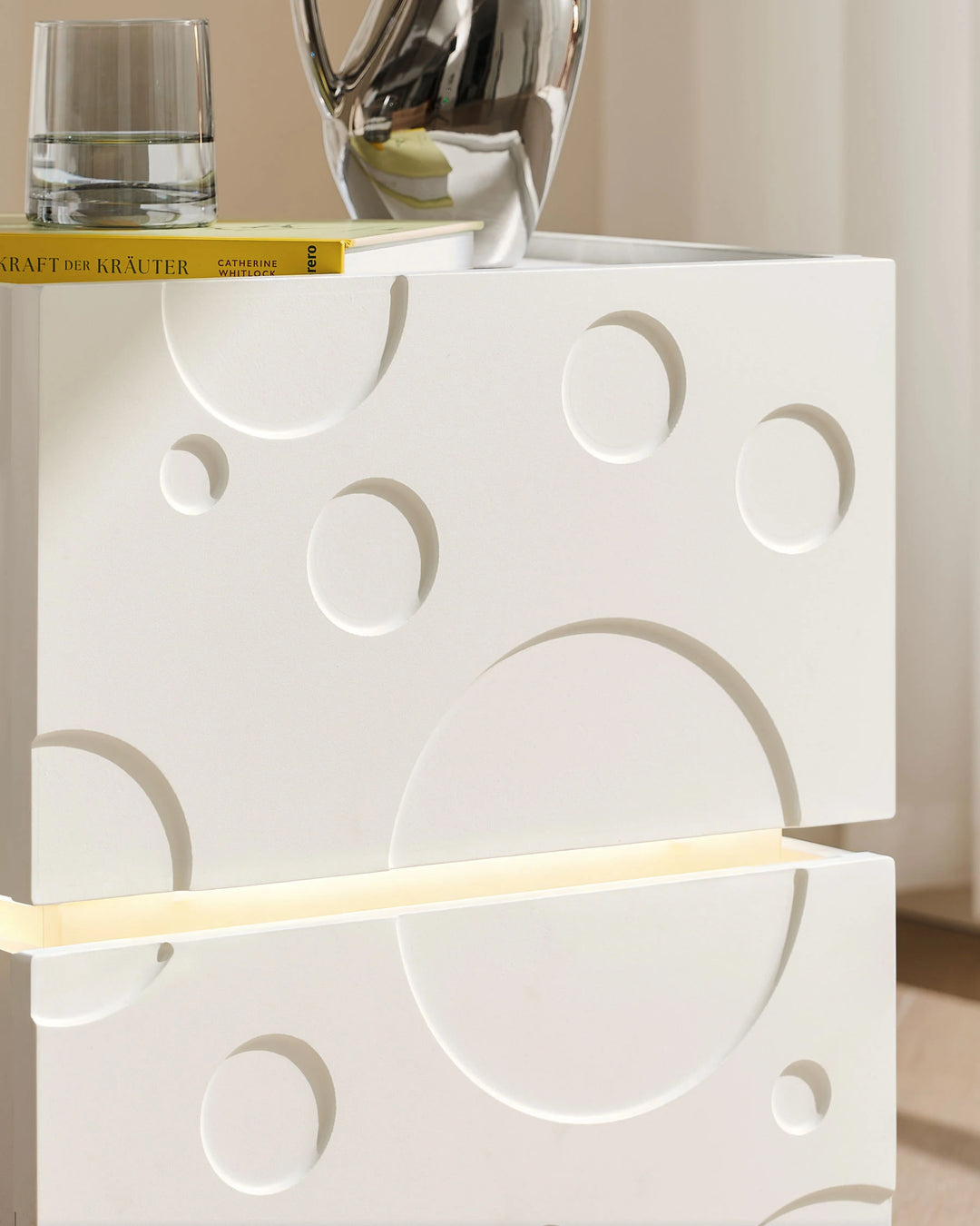 Close-up of Bubbli bedside table bubble textured drawer front design