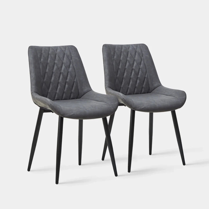 Carl Dining Chair, showing details of a set of 2 grey chairs - with diamond pattern backs and black metal legs, in a white background.