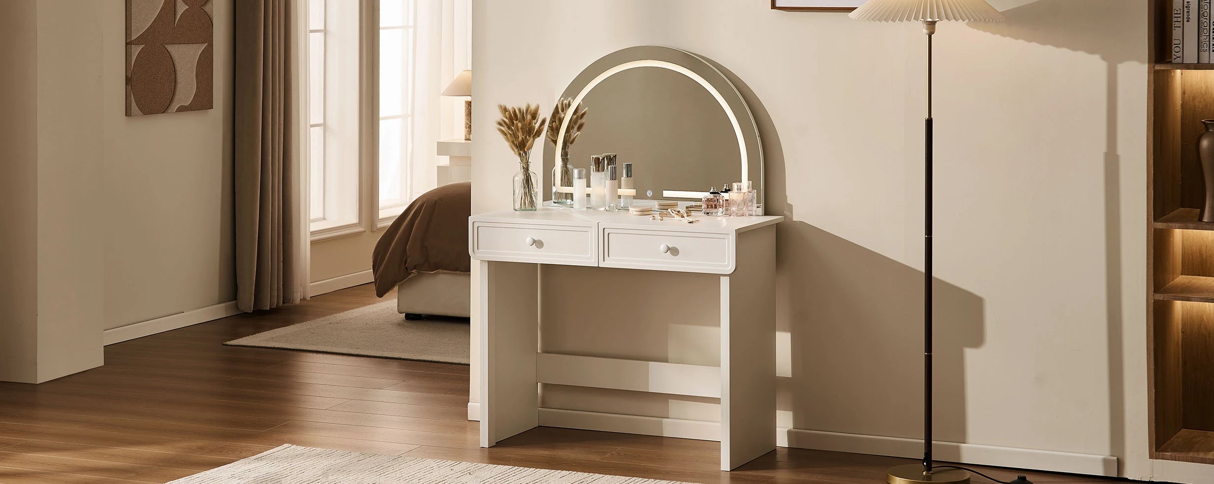 Ceris curved-mirror vanity desk with warm LED lights, creating a cosy bedroom look