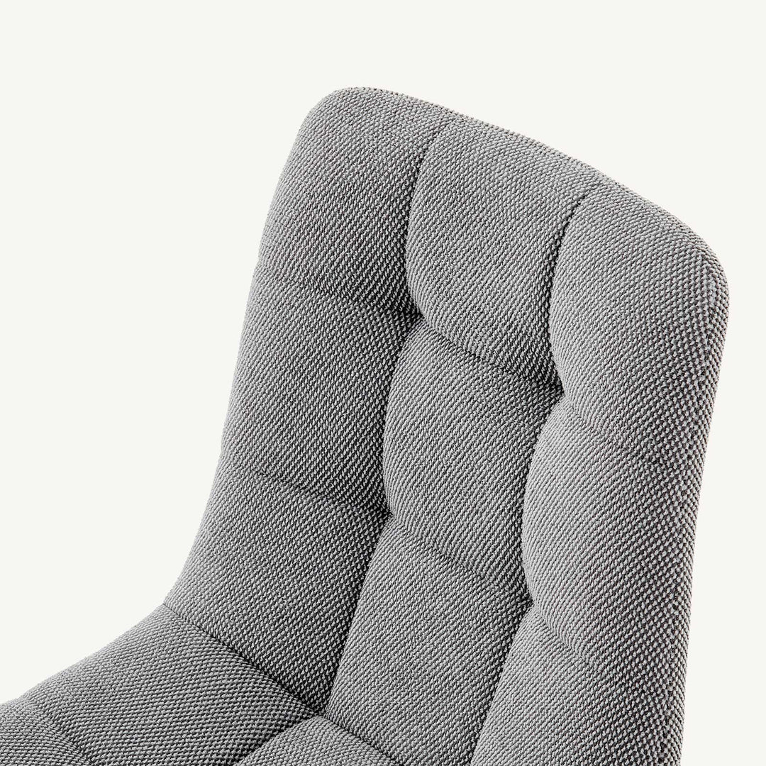 Close-up of the linen woven fabric detail on the backrest of the grey Christie Fabric Dining Chair.