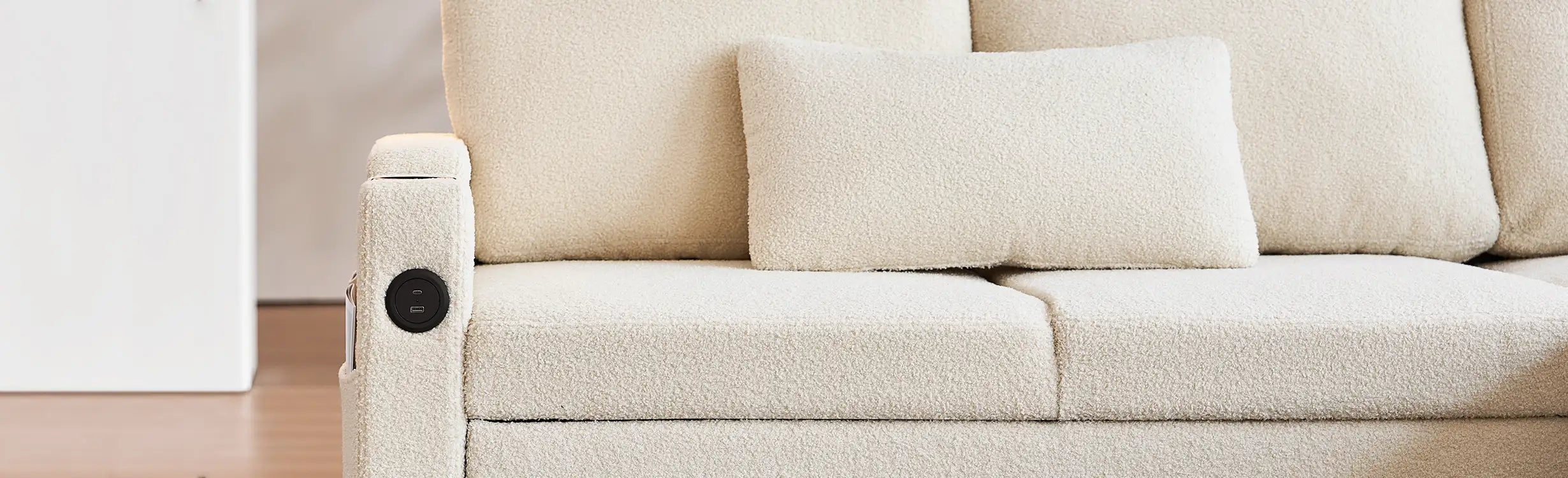 Close-up of Clarkson Sofa Bed boucle fabric, soft, tactile, and premium upholstery texture
