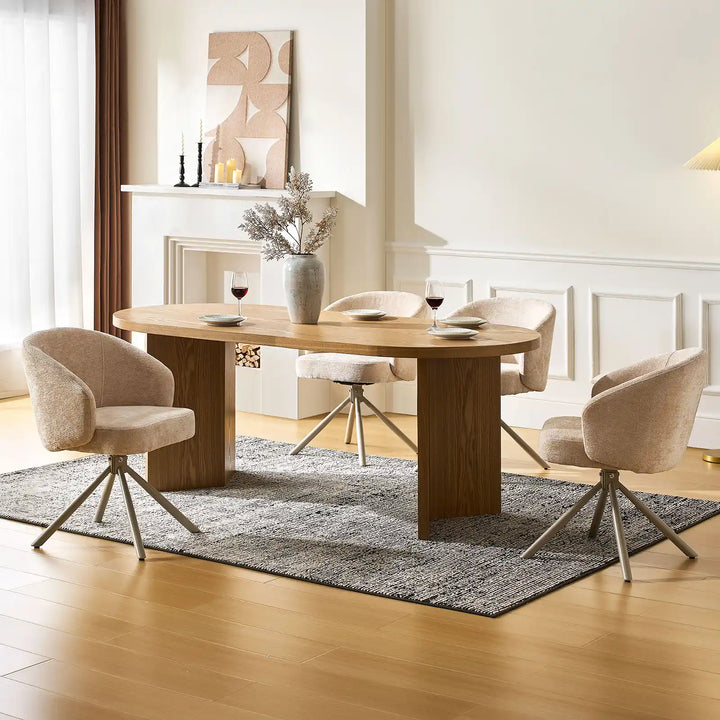 Four Cleo cream Swivel Chairs around a dining table in a bright dining space
