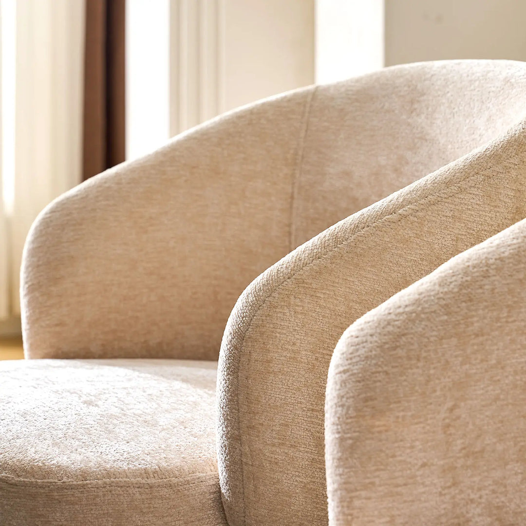 Curved armrest and soft cream chenille fabric of Cleo cream Swivel Chair
