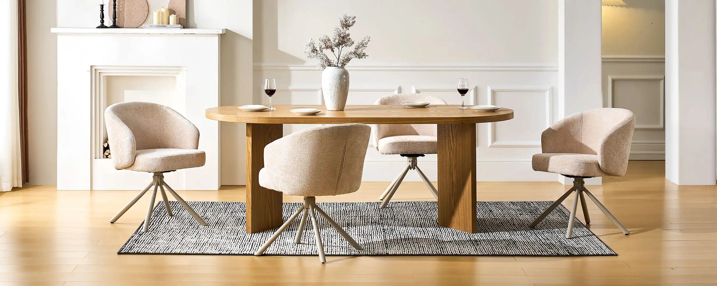 Four Cleo cream Swivel Chairs around a dining table in a bright dining space
