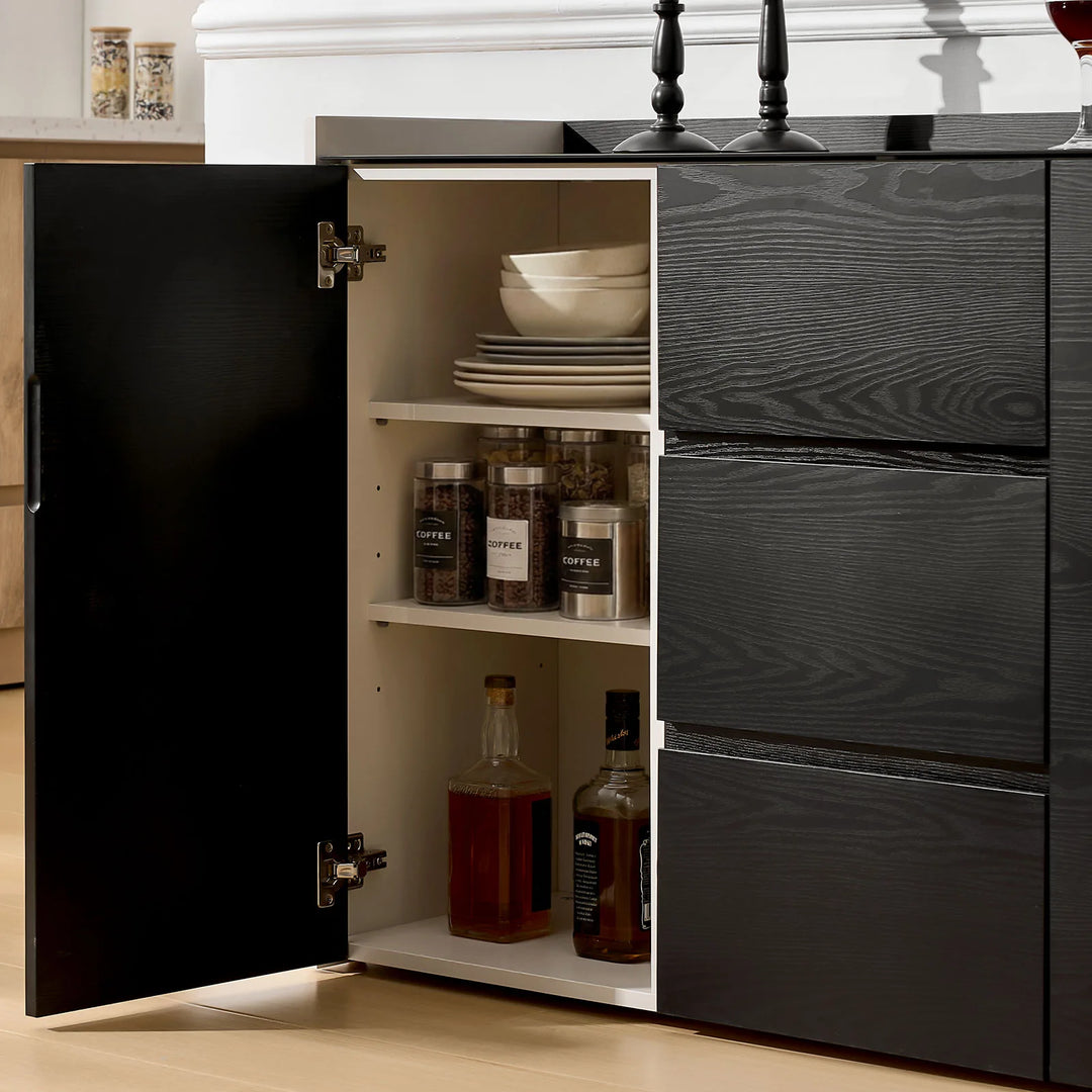 The Dakota Large Dining Sideboard has doors that open to reveal shelves for storing tableware.