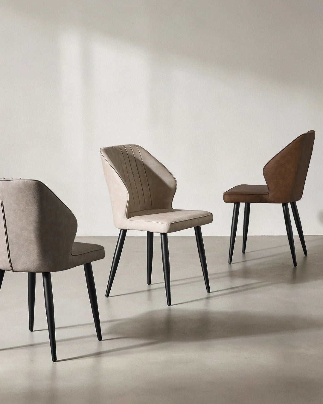 Mixed set of Danforth chairs in different colours to suit various interior decor styles.