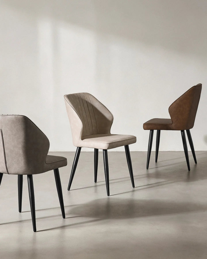 Mixed set of Danforth chairs in different colours to suit various interior decor styles.