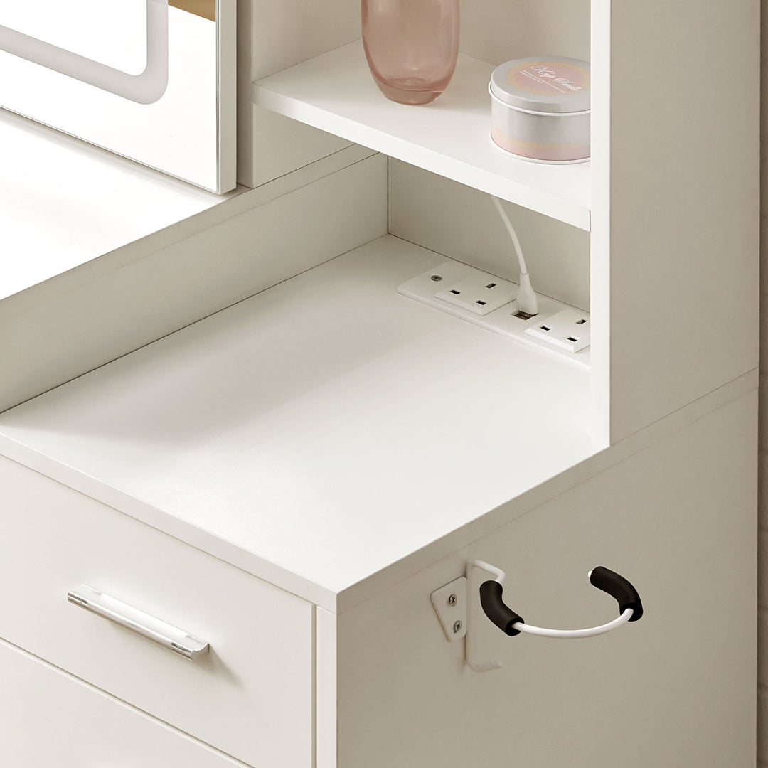 Daphne Dressing Table charging station on desktop powering beauty devices.