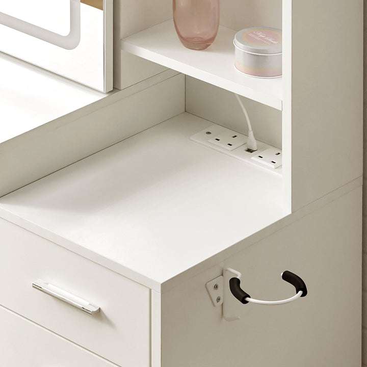 Daphne Dressing Table charging station on desktop powering beauty devices.