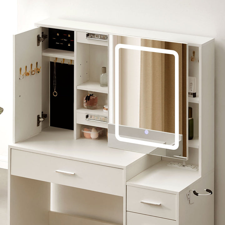Daphne Dressing Table jewellery cabinet open with ring slots, earring pads and hidden space behind mirror.