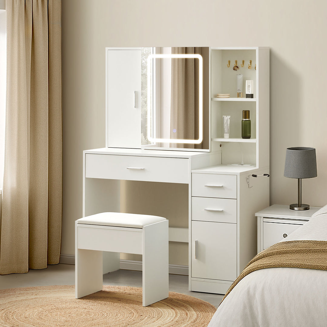 Daphne Dressing Table & Stool Set placed by bed in bright bedroom.