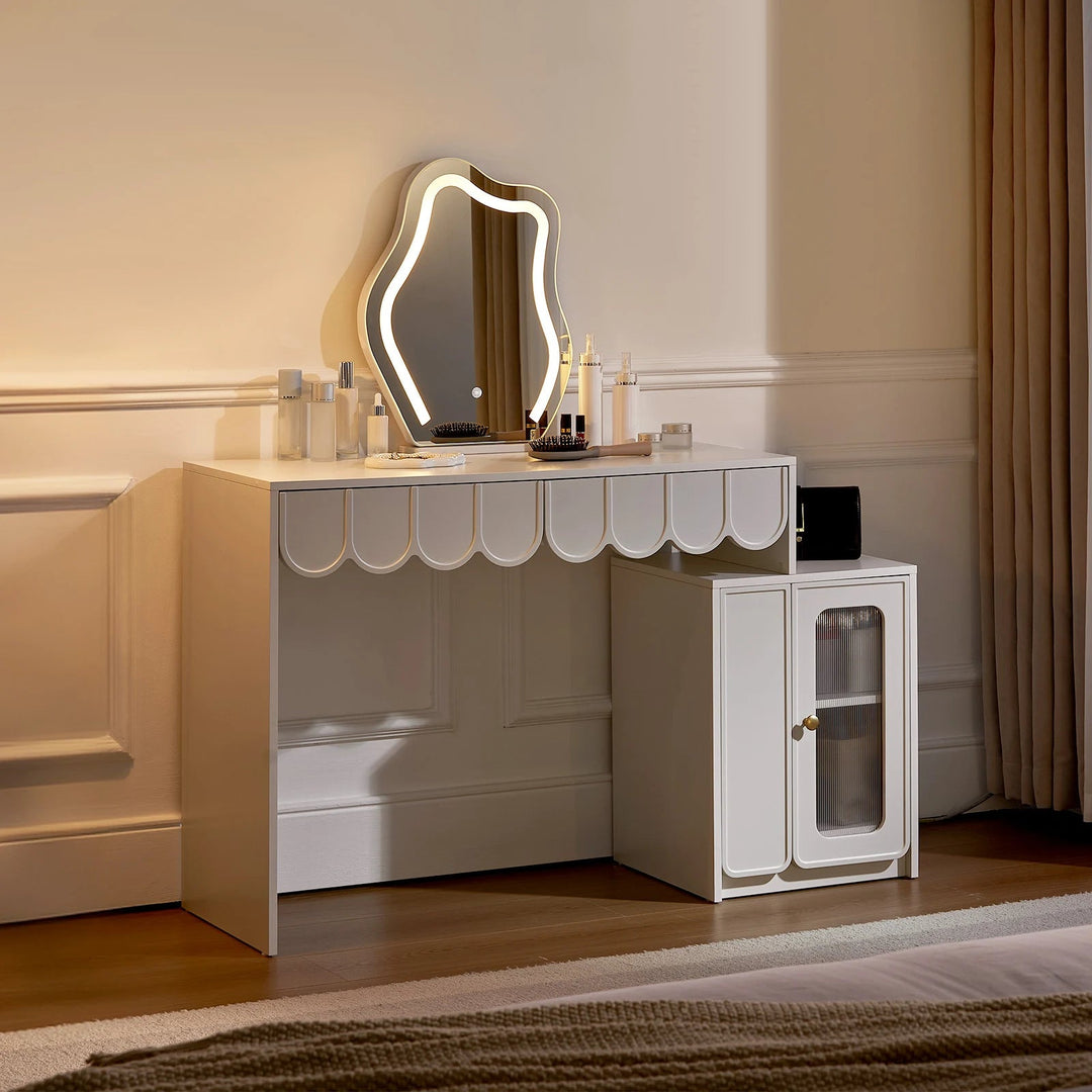 Doris Cloud Mirror Dressing Table with lights on in night-time bedroom