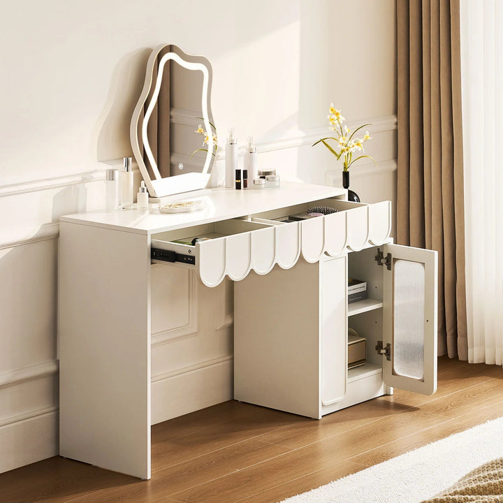 Open drawer and cabinet of the Doris Cloud Mirror Dressing Table with visible storage