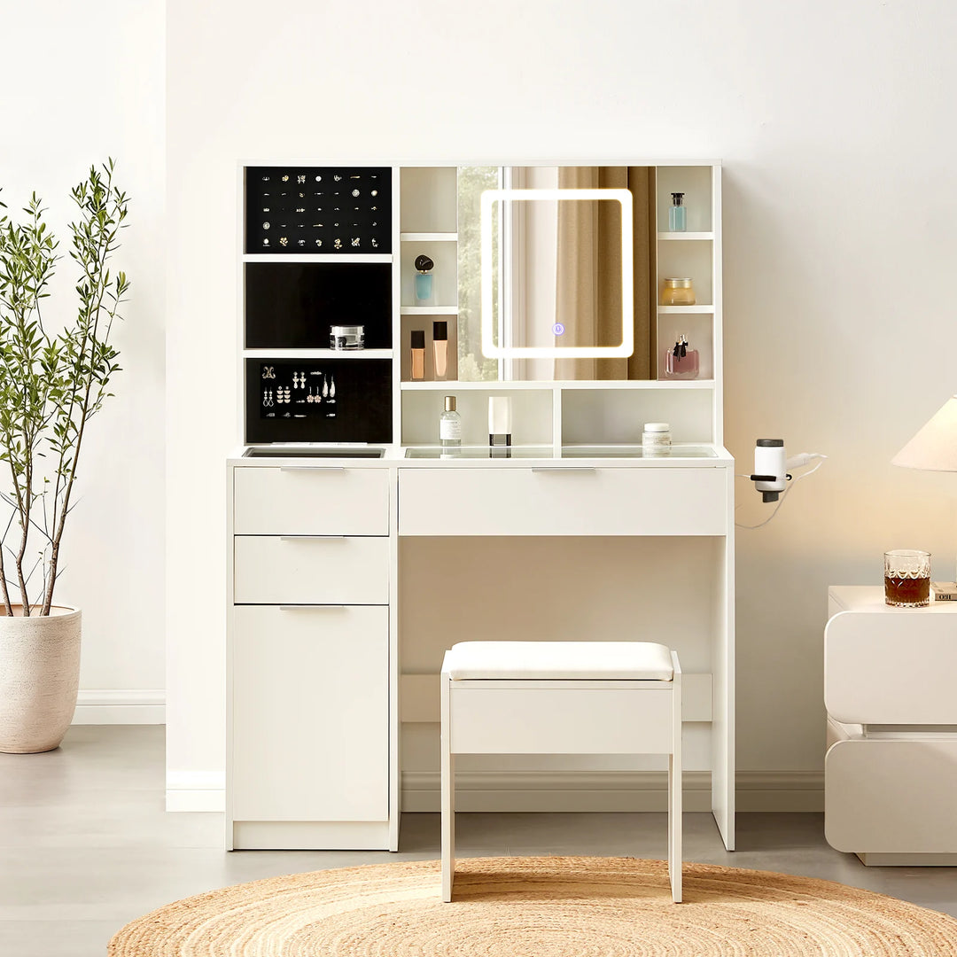 Dorla Dressing Table & Stool Set in a bright bedroom beside a bedside table