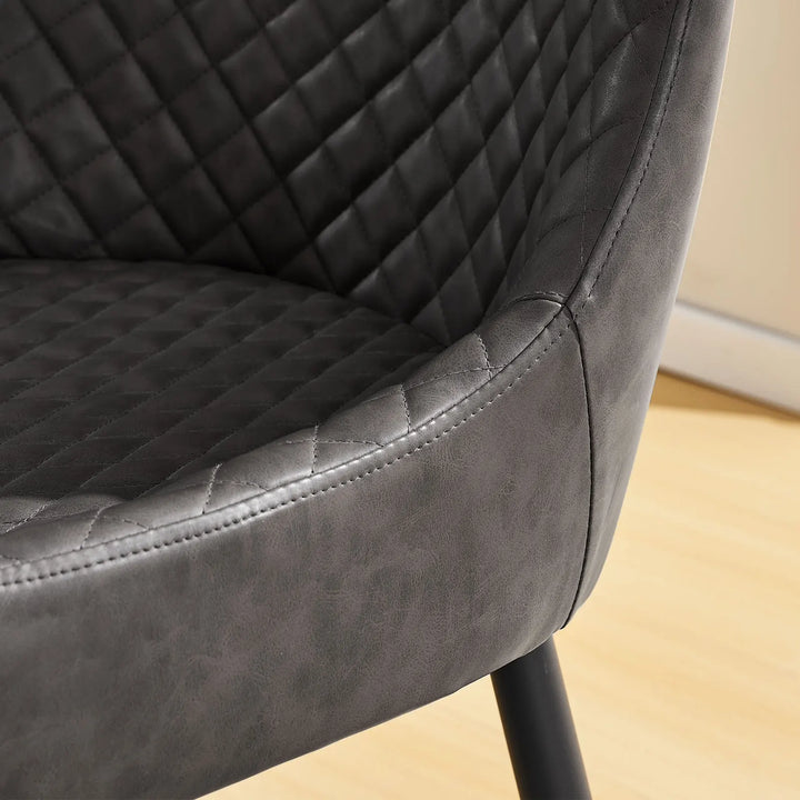 Rear stitching detail of the grey faux leather dining chair showing clean and refined craftsmanship