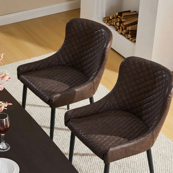Top view of a brown faux leather dining chair showing a wide padded seat and supportive backrest