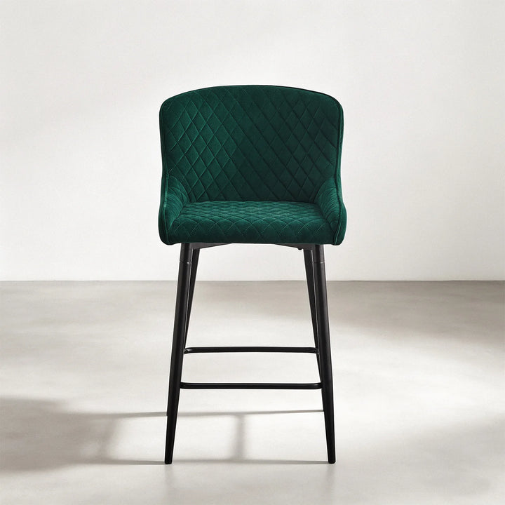 Front view of Dundas green velvet bar stool with diamond quilted seat and supportive curved backrest