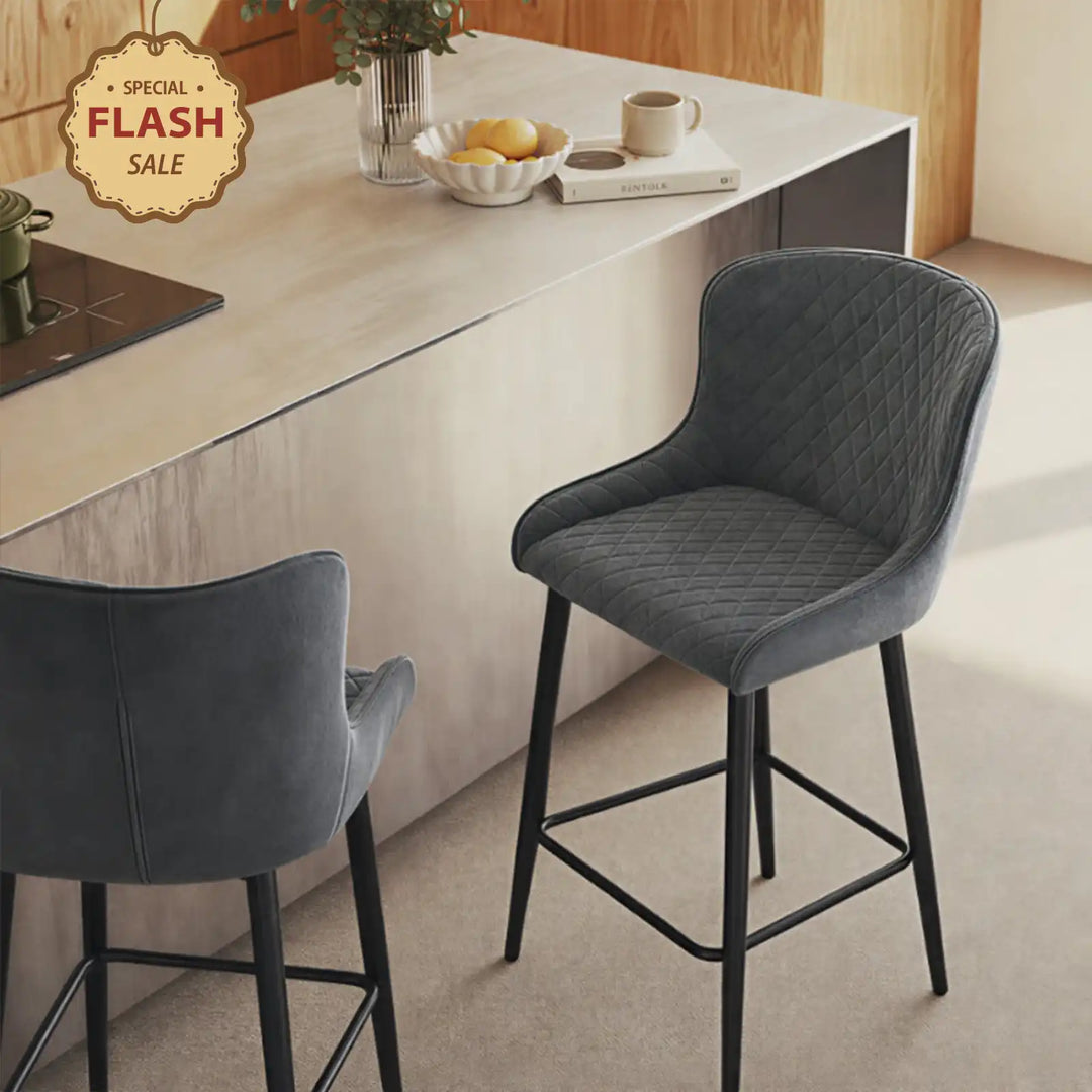 Dundas Velvet Bar Stools beside a kitchen island