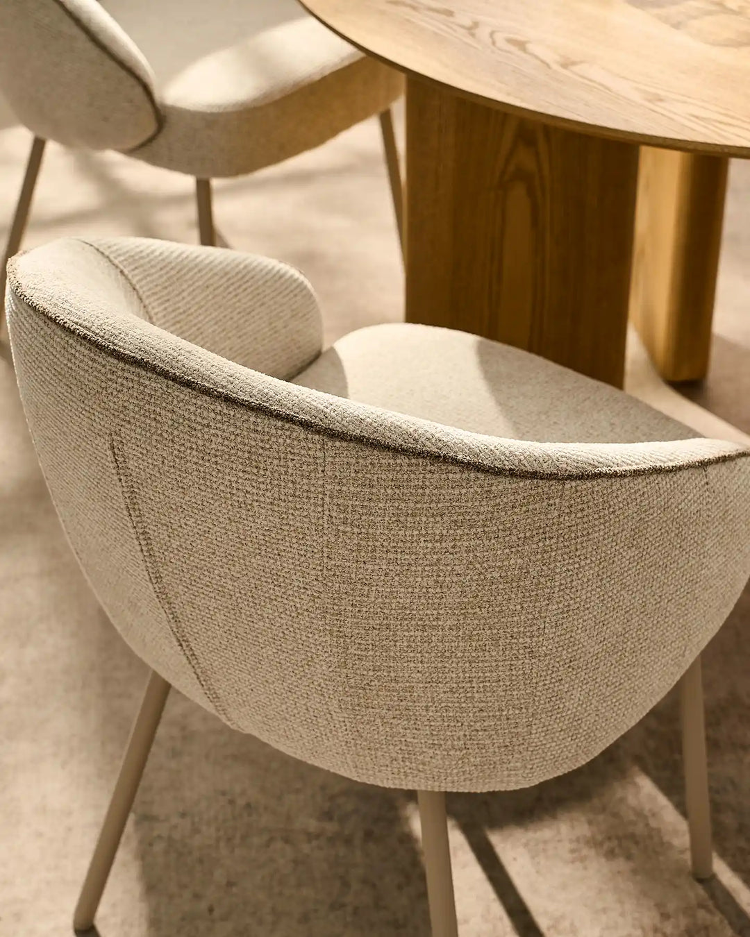 Detail of the Elowen cream and brown chenille dining chair featuring a generously padded curved backrest for everyday comfort