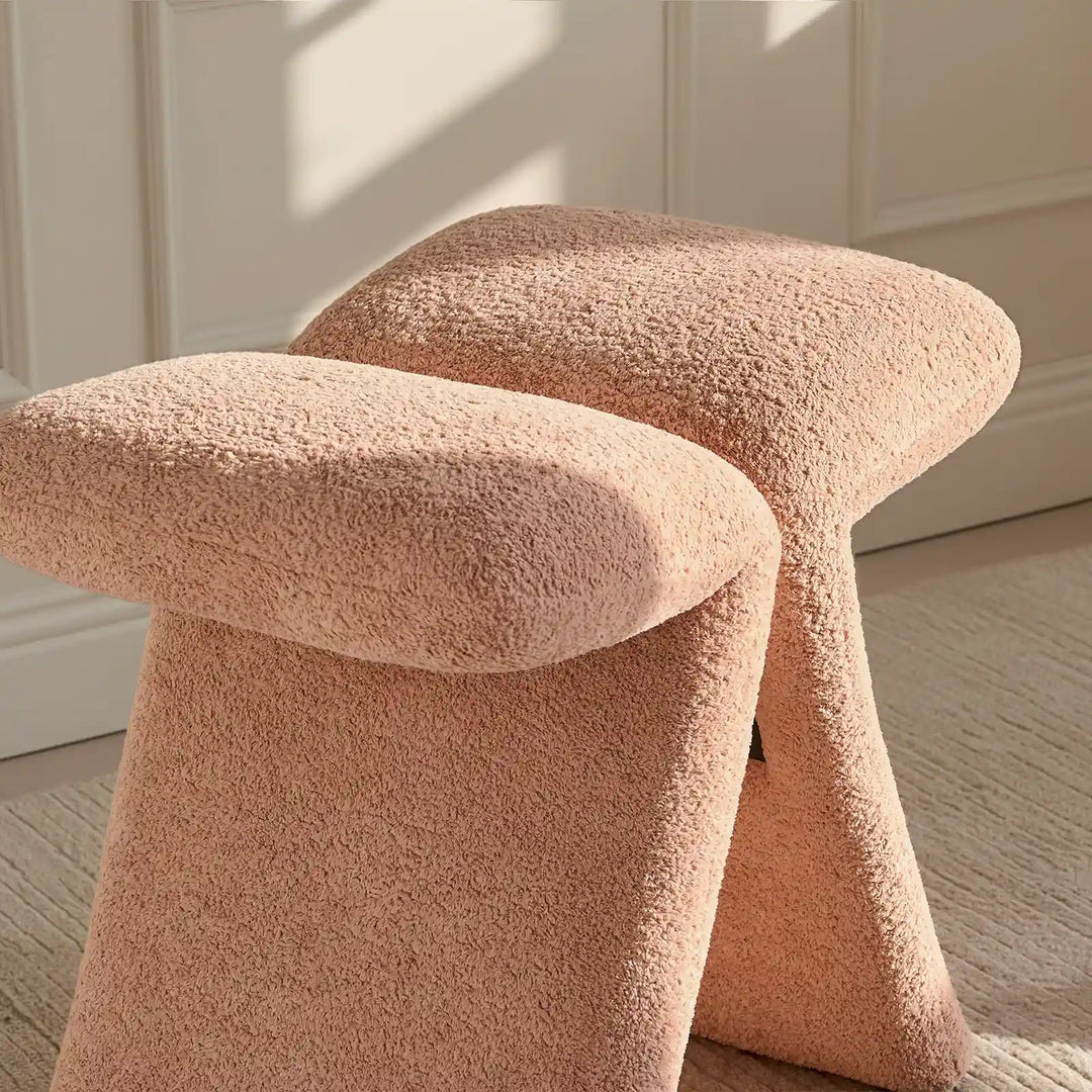 Faye Pink Accent Stool inspired by a bow and butterfly shape, a sculptural accent ideal as a birthday or housewarming gift