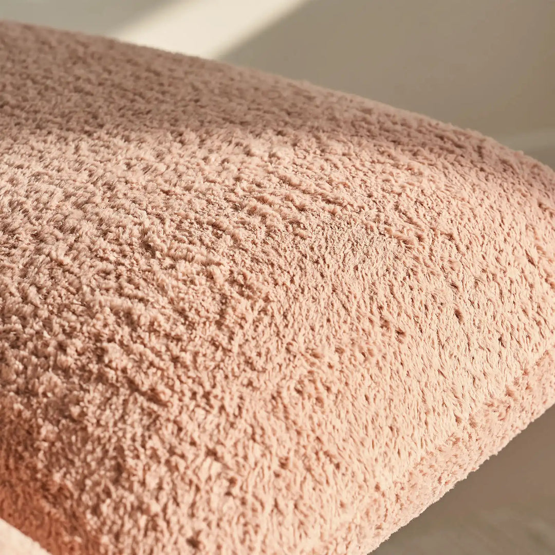 Faye Pink Accent Stool upholstered in soft bouclé fabric, offering a comfortable and supportive seat