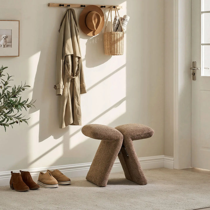 Faye Teddy Brown Accent Stool used as a hallway shoe stool near the front door, ideal for everyday use