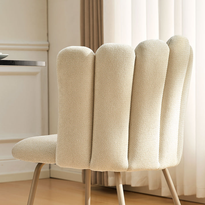  Close-up of Fleur Cream Fabric side chair with petal backrest stitching detail.