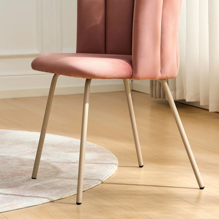 Close-up of pink Fleur Fabric desk chair taupe metal legs with sleek finish.
