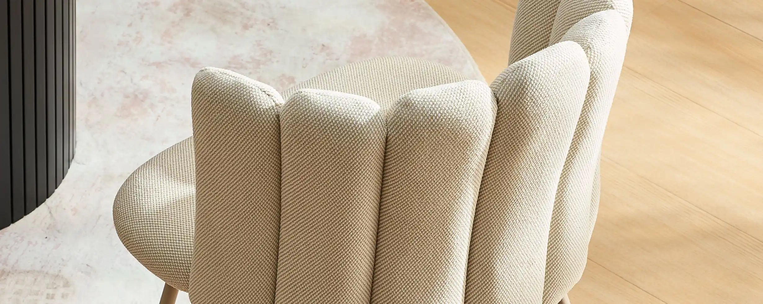 Top view of modern Fleur Cream Fabric dining chair with curved petal back design.