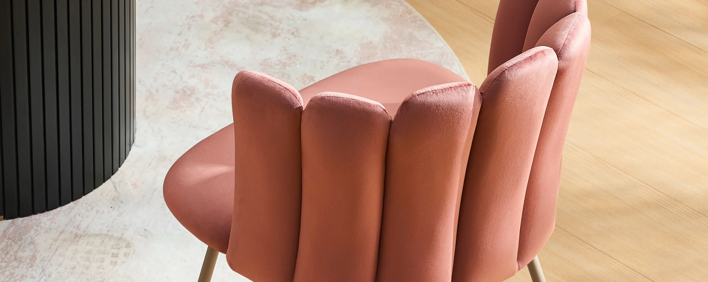 Top view of modern Fleur pink Fabric dining chair with curved petal back design.