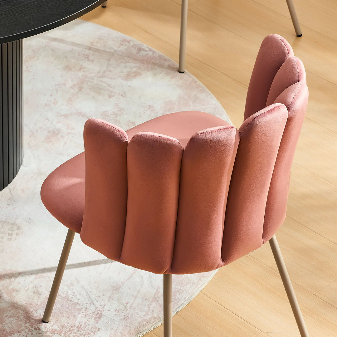 Top view of modern Fleur pink Fabric dining chair with curved petal back design.