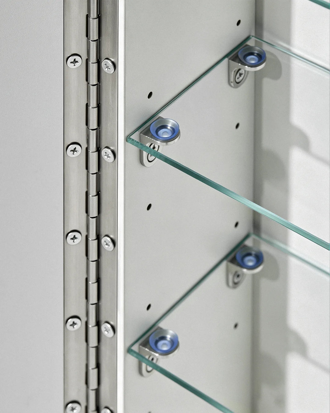 Durable stainless steel piano hinge on Arcadia bathroom cabinet door for long-term stability.