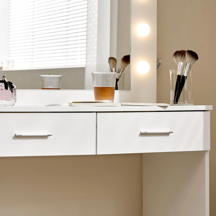 Close-up of the silver brushed metal drawer handles on the Hollywood White Dressing Table Set