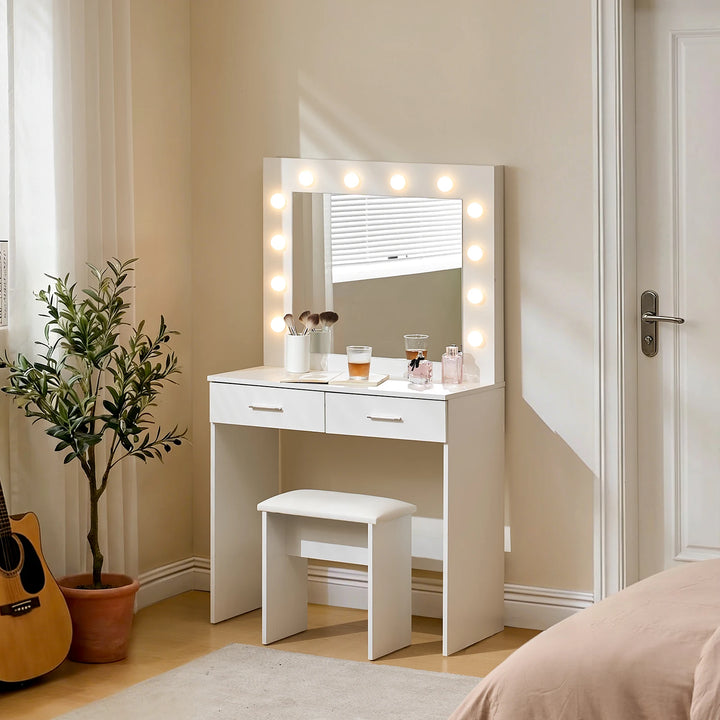 Hollywood White Dressing Table Set shown from the side in a bright bedroom during the daytime