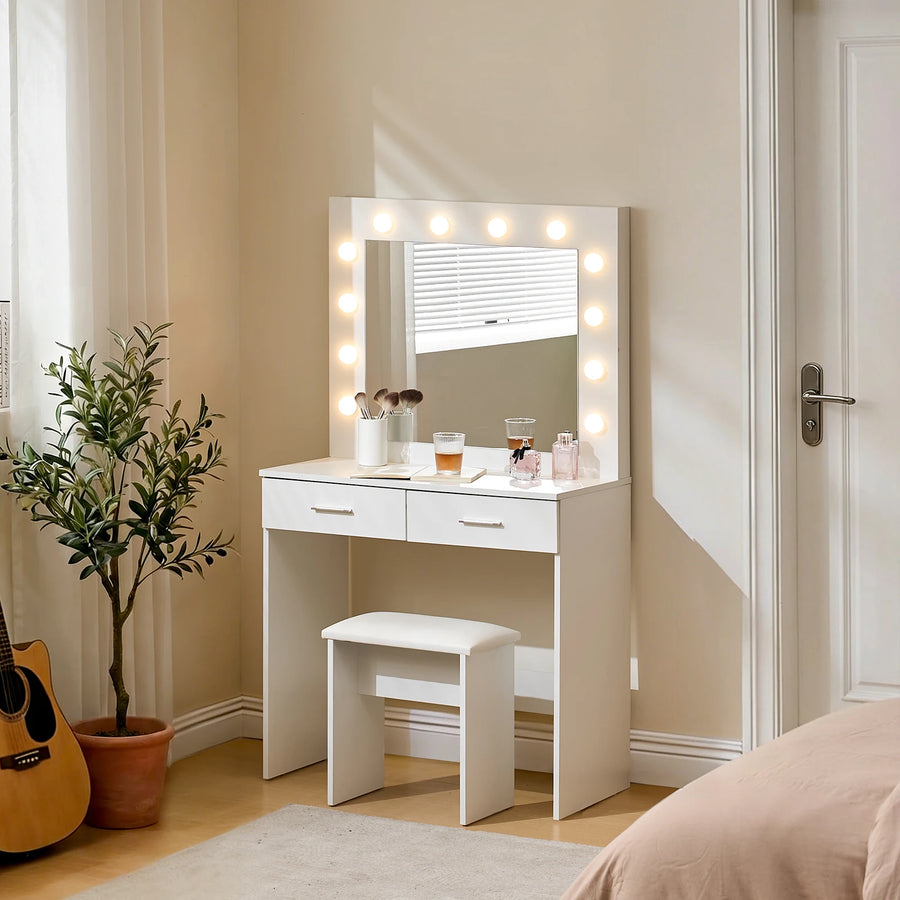 Hollywood White Dressing Table Set shown from the side in a bright bedroom during the daytime