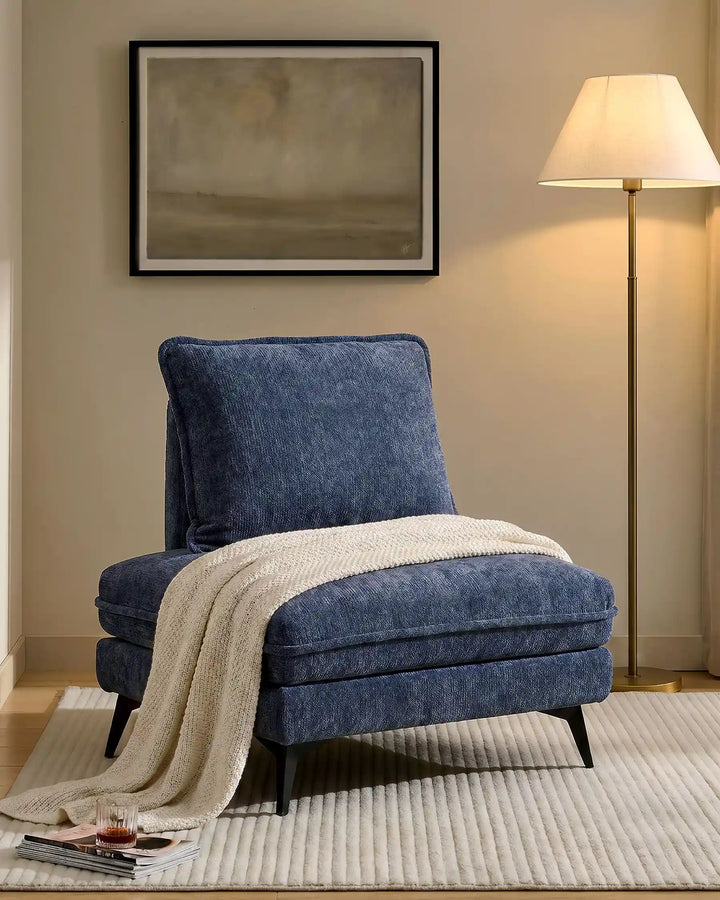 Hudson blue modular sofa (left) placed in a living room corner