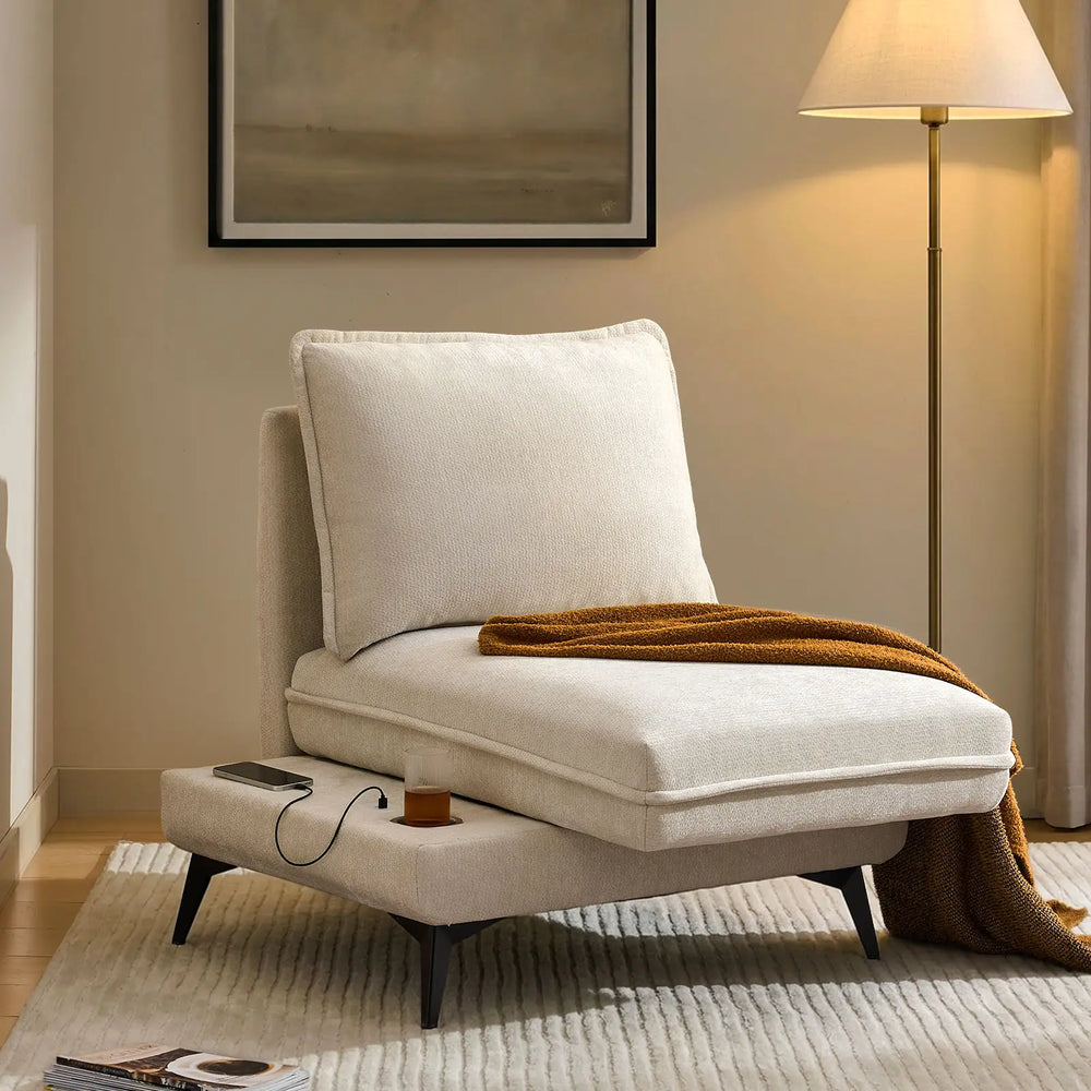 Hudson modular sofa (left) in living room corner with extended seat showing USB port and built-in cup holder