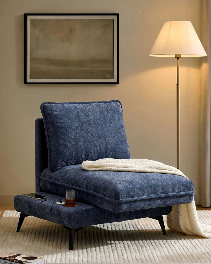 Hudson blue modular sofa (left) in living room corner with extended seat showing USB port and built-in cup holder