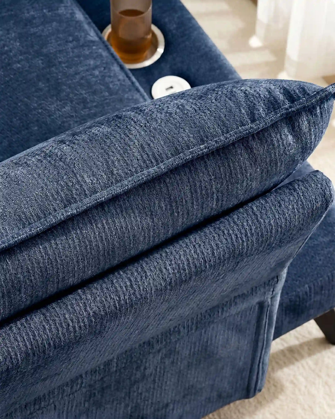 Top view of blue Hudson modular sofa (left) highlighting fine craftsmanship and detailing
