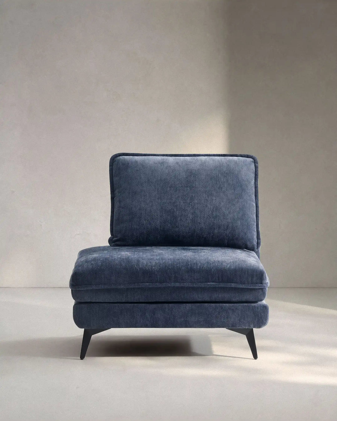 Hudson blue modular sofa (left) on white background showing front view