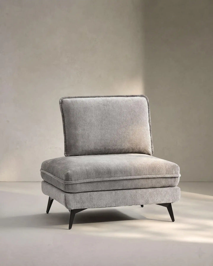 Hudson grey modular sofa (left) on white background showing side view