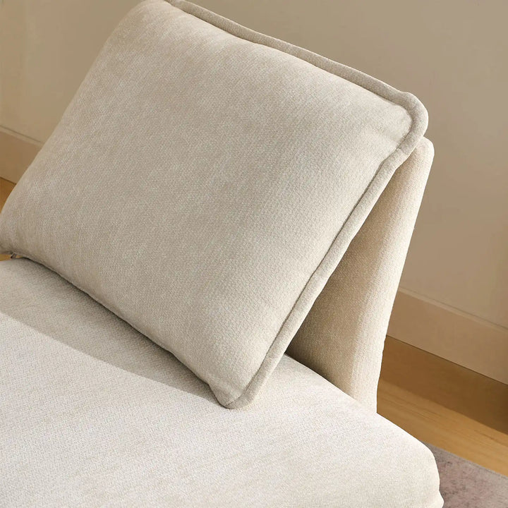 Close-up of Hudson modular sofa (right) backrest cushions showing plush comfort and soft chenille fabric