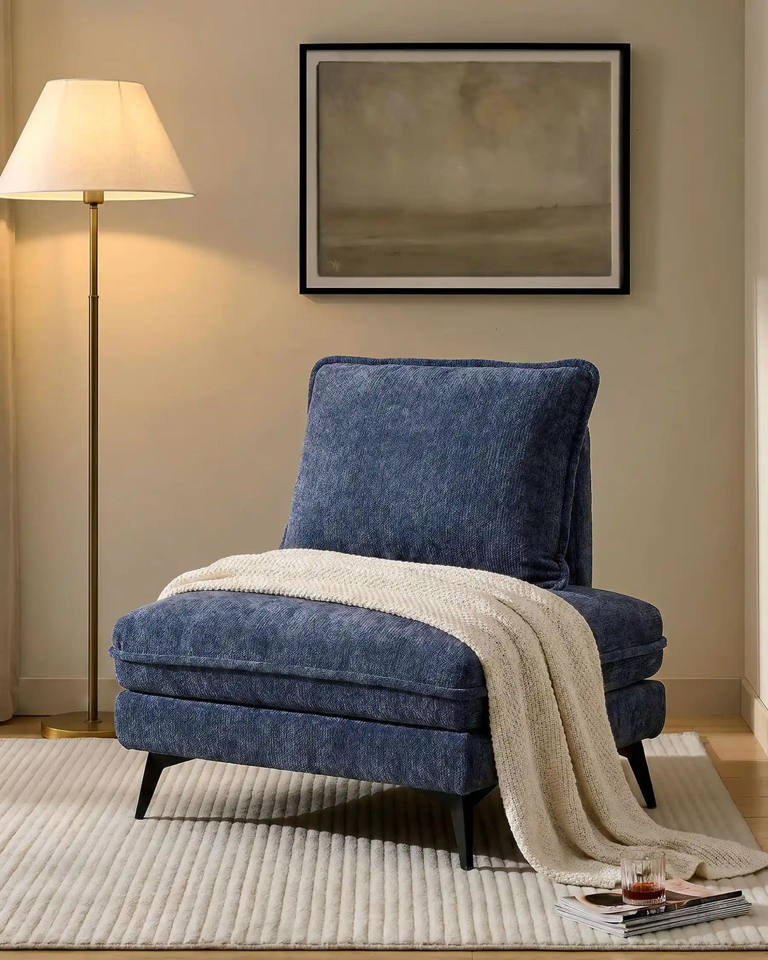 Hudson blue modular sofa (right) placed in a living room corner
