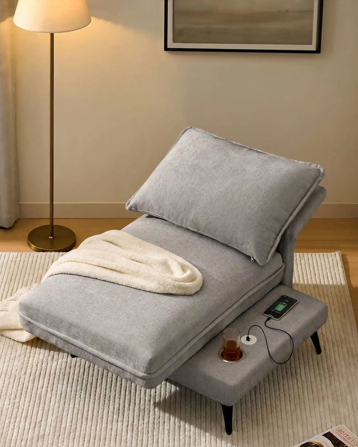 Hudson grey modular sofa (right) with fully reclined backrest, transforming into a lounge sofa in living room corner