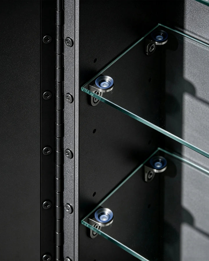 Detailed view of piano hinge and glass shelf brackets inside the black Arcadia cabinet.