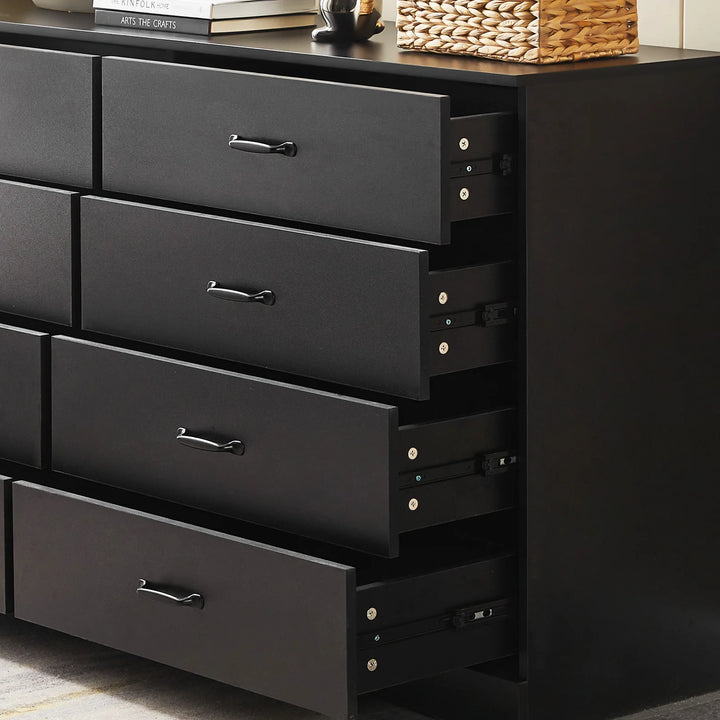 Kamai black chest of drawers with 8 drawers, 4 open to reveal spacious storage and smooth black metal slides.