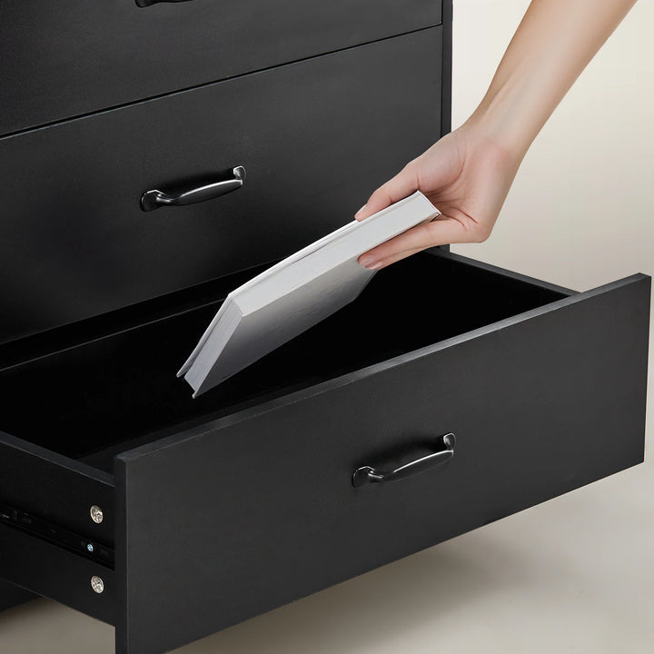 Detail of smooth black metal drawer slides on Kamai black chest of drawers