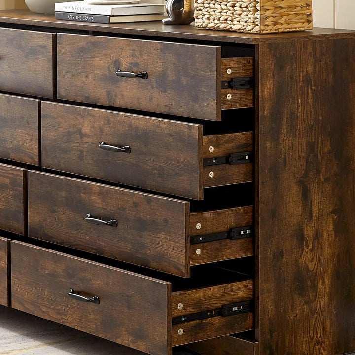 Kamai rust brown chest of drawers with 8 drawers, 4 open to reveal spacious storage and smooth black metal slides.