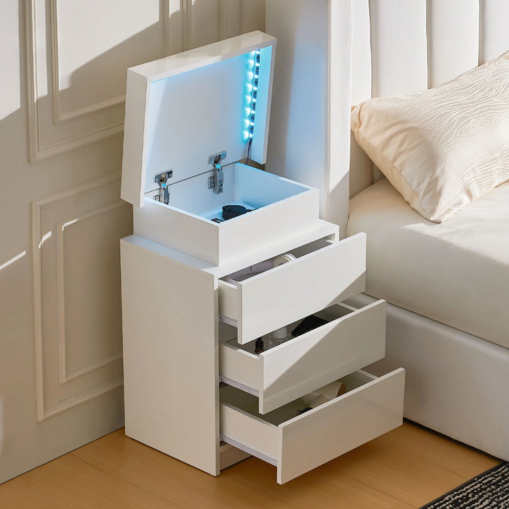 The side view of the white Kumar bedside table with RGB light strip, with all drawers open, featuring 3 drawers, 1 hidden part.